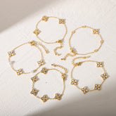 Pulseras de acero inoxidable 304 con circonita acrílica bañadas en oro de 18 quilates, estilo clásico, con diseño de flor de viaje, a granel.