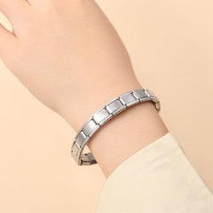 Pulsera elástica de acero inoxidable ajustable.