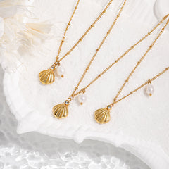 Collar de perlas de agua dulce con concha de acero de titanio