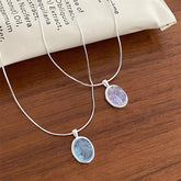 Collar con colgante ovalado de aguamarina natural, cadena de hueso de serpiente en plata de ley 925