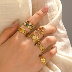Anillos abiertos chapados en acero inoxidable 304 con diseño de flor de estilo simple al por mayor