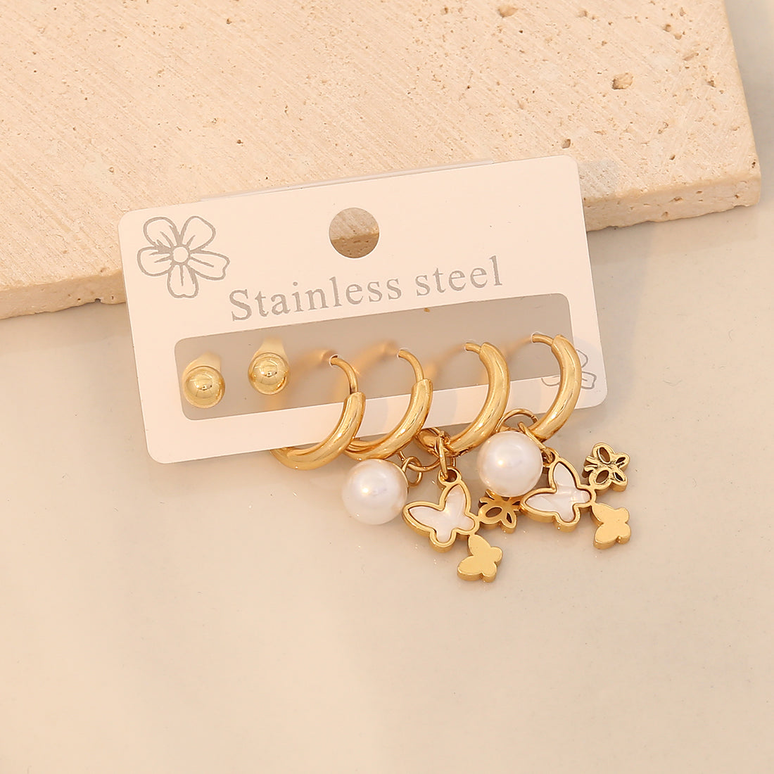 3 pares de aretes colgantes de acero inoxidable 304 chapados en oro de 18 quilates con diseño de estrella de viaje de estilo simple