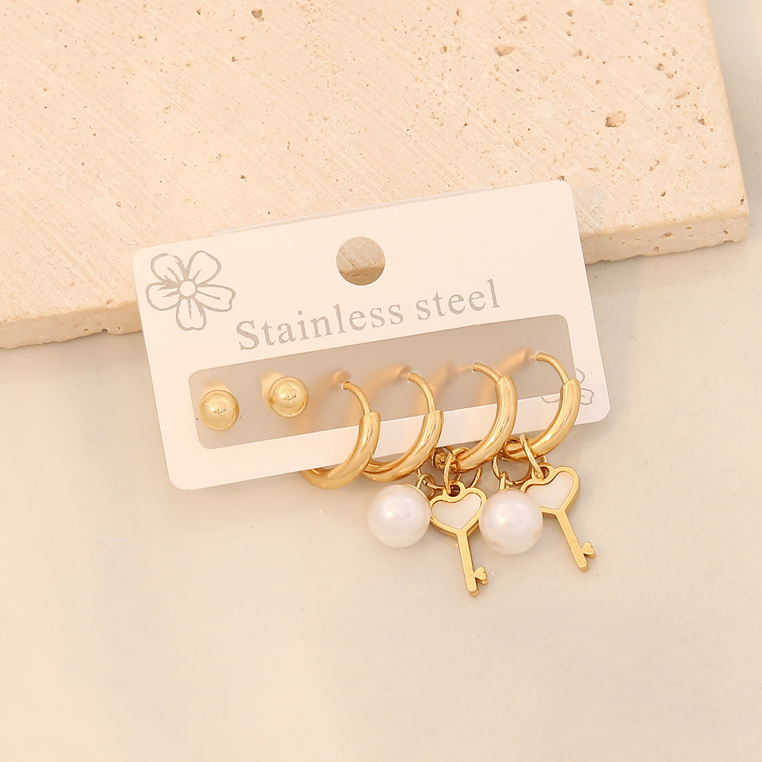 3 pares de aretes colgantes de acero inoxidable 304 chapados en oro de 18 quilates con diseño de estrella de viaje de estilo simple