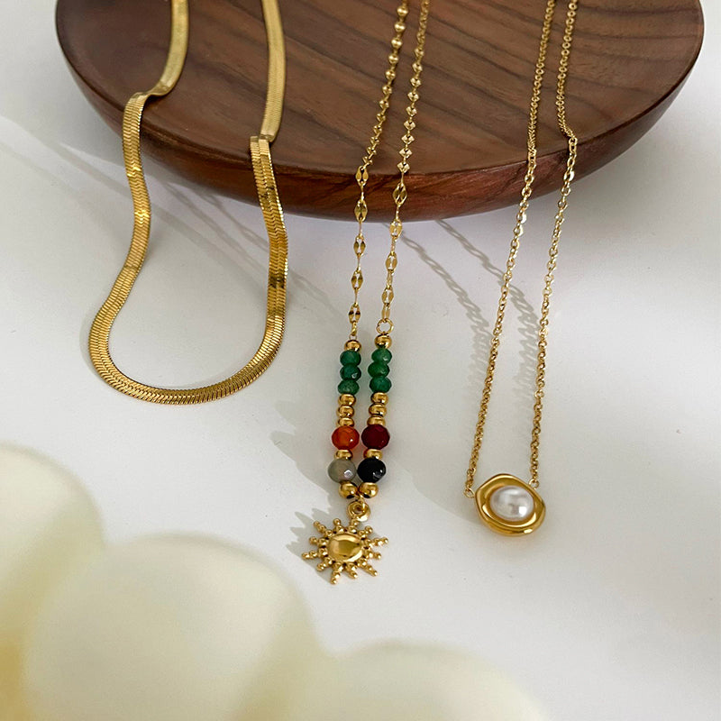 Joyería al por mayor: elegante collar con colgante de girasol (Jz001), estilo francés retro, perla de acero inoxidable 316L, imitación de perla, piedra natural, chapado en oro de 18 quilates.