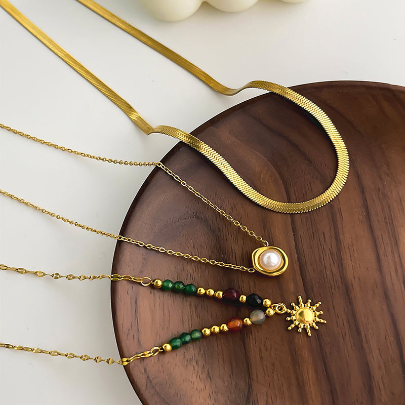 Joyería al por mayor: elegante collar con colgante de girasol (Jz001), estilo francés retro, perla de acero inoxidable 316L, imitación de perla, piedra natural, chapado en oro de 18 quilates.