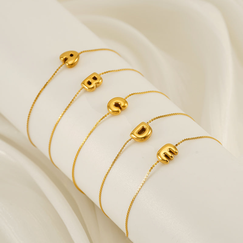 Pulseras informales de acero inoxidable 304 chapadas en oro de 18 quilates con letras de estilo sencillo al por mayor