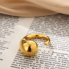 Anillos abiertos de acero y titanio de color sólido con gotas de agua geométricas de estilo simple.