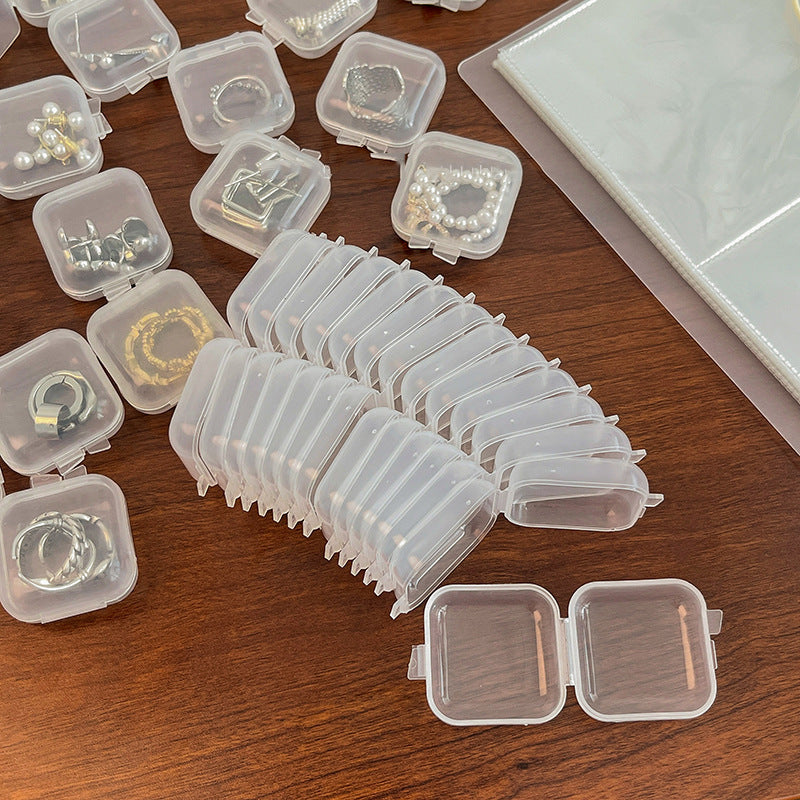 Factory direct plastic transparent small square box jewelry box earplugs small box jewelry mini storage box can be fixed LOGO