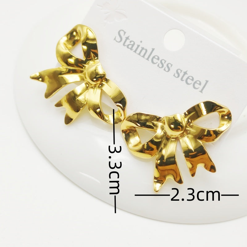 1 par de elegantes pendientes de acero inoxidable 304 con nudo de lazo chapados en oro de 18 quilates