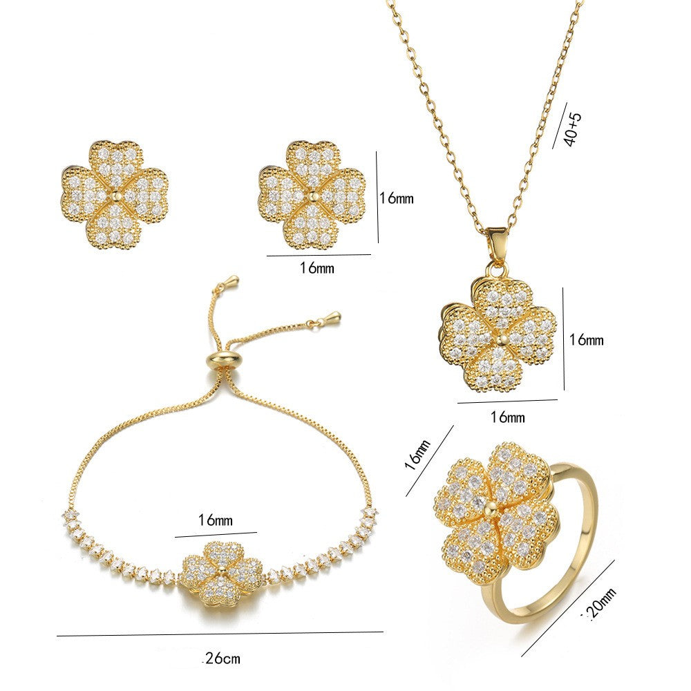 Joyería al por mayor: Anillos, pendientes y collar con incrustaciones de circonitas de acero y titanio con diseño de conejo, flor y copo de nieve.
