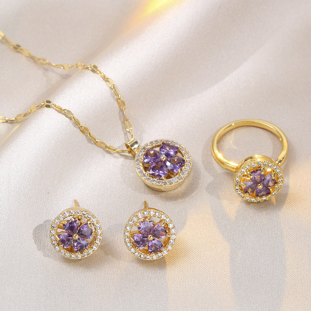 Joyería al por mayor: Anillos, pendientes y collar con incrustaciones de circonitas de acero y titanio con diseño de conejo, flor y copo de nieve.