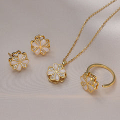 Joyería al por mayor: Anillos, pendientes y collar con incrustaciones de circonitas de acero y titanio con diseño de conejo, flor y copo de nieve.