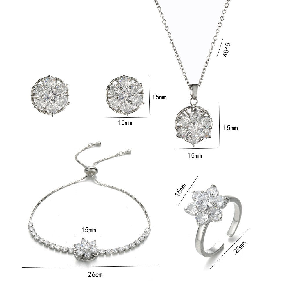 Joyería al por mayor: Anillos, pendientes y collar con incrustaciones de circonitas de acero y titanio con diseño de conejo, flor y copo de nieve.