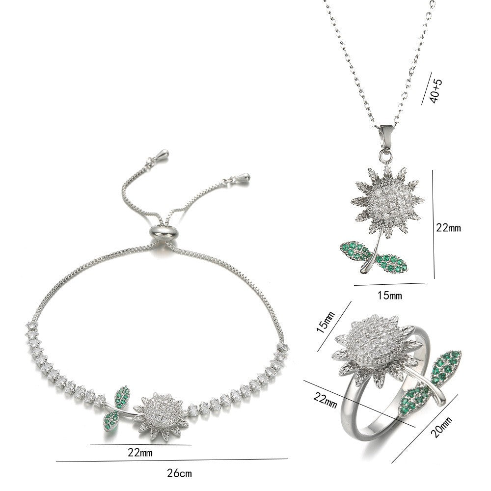 Joyería al por mayor: Anillos, pendientes y collar con incrustaciones de circonitas de acero y titanio con diseño de conejo, flor y copo de nieve.