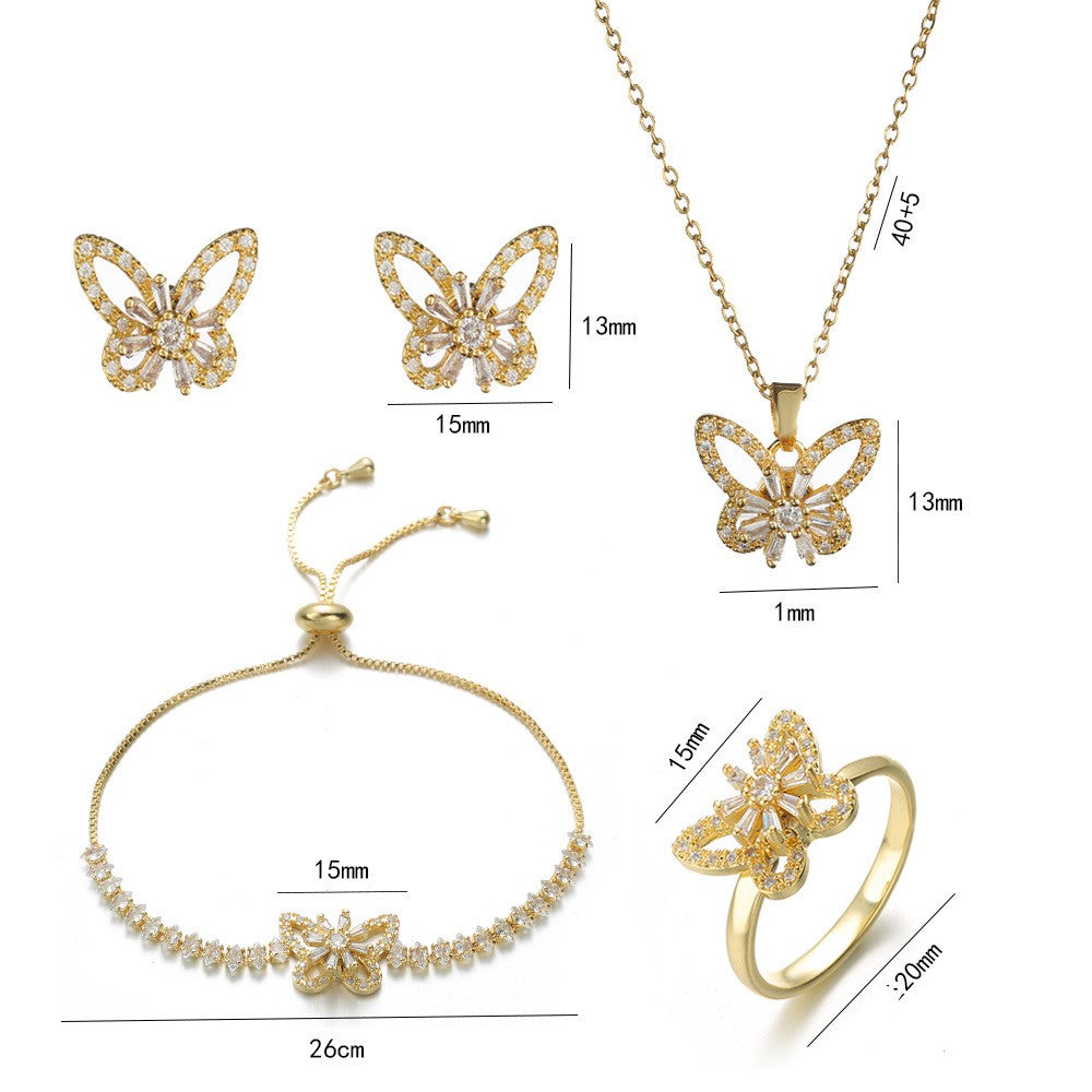 Joyería al por mayor: Anillos, pendientes y collar con incrustaciones de circonitas de acero y titanio con diseño de conejo, flor y copo de nieve.