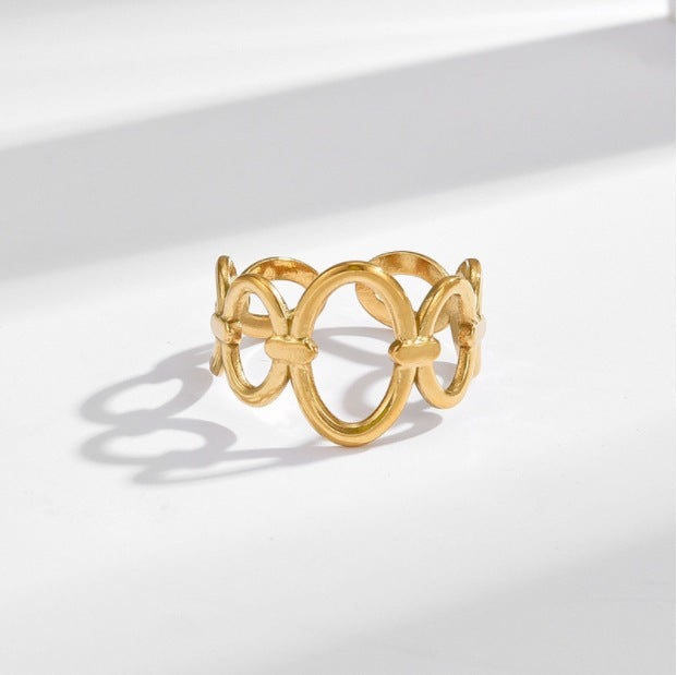 Anillos chapados en acero y titanio con nudo de lazo, joyería al por mayor