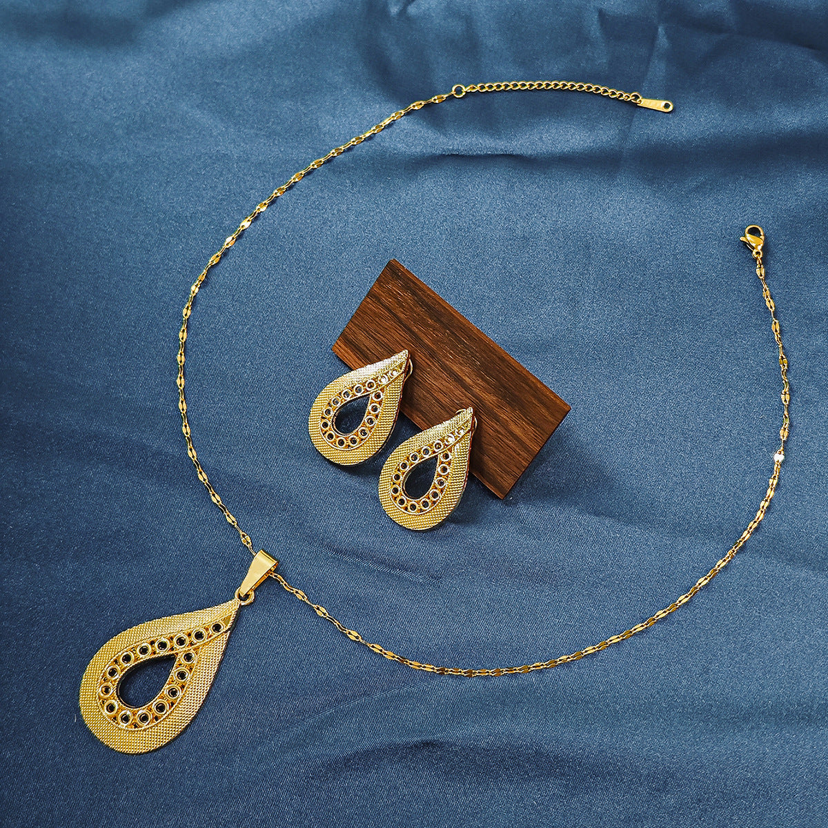 Conjunto de joyería elegante con diseño geométrico clásico de acero inoxidable 304 chapado en oro al por mayor