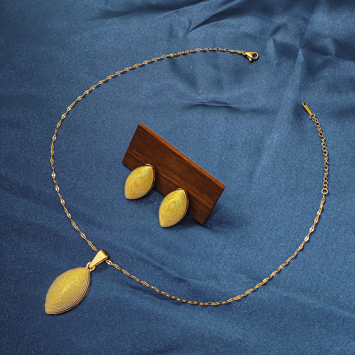Conjunto de joyería elegante con diseño geométrico clásico de acero inoxidable 304 chapado en oro al por mayor