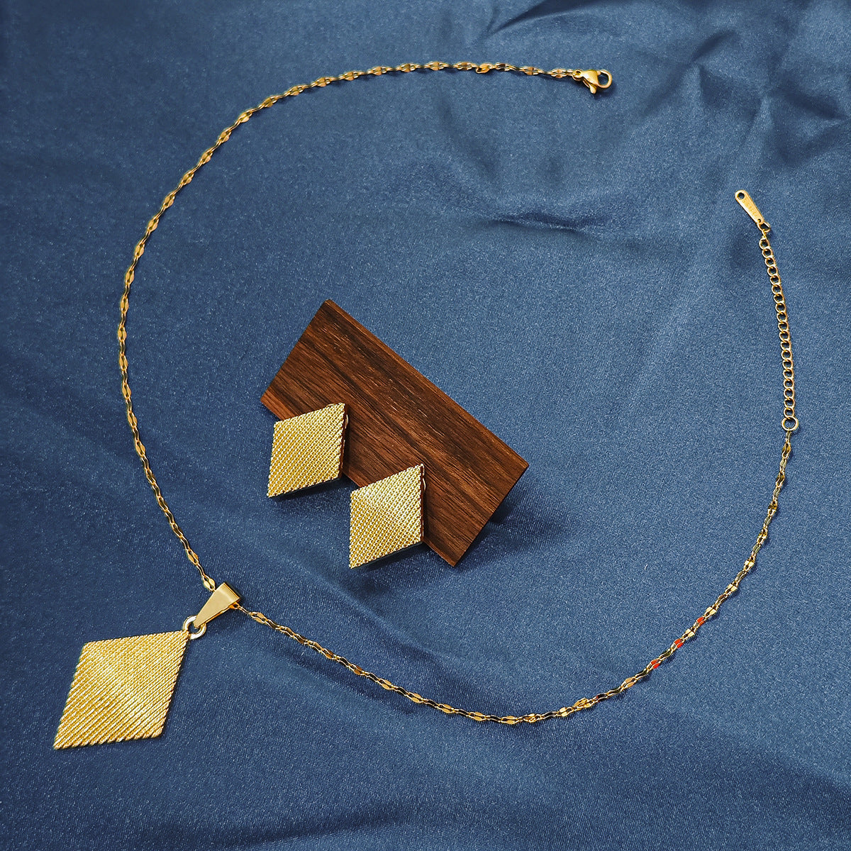 Conjunto de joyería elegante con diseño geométrico clásico de acero inoxidable 304 chapado en oro al por mayor