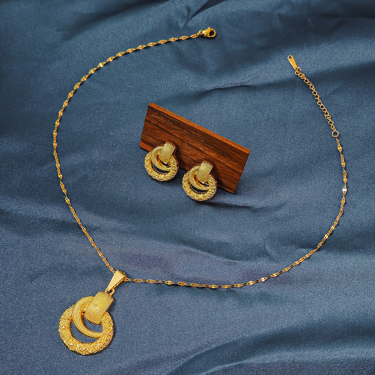 Conjunto de joyería elegante con diseño geométrico clásico de acero inoxidable 304 chapado en oro al por mayor