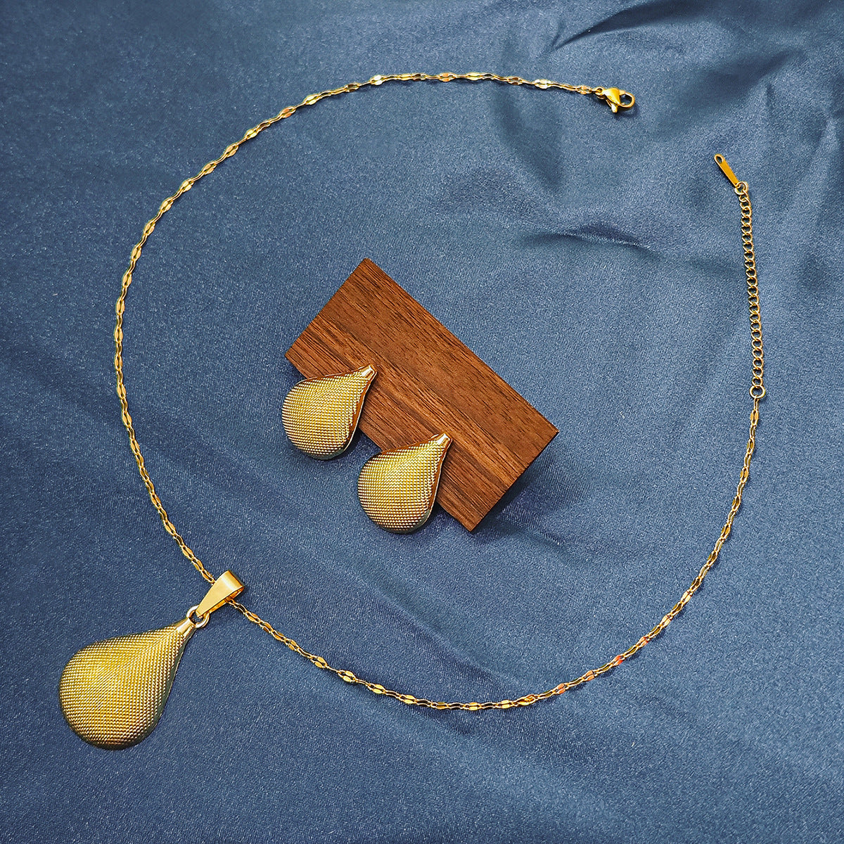 Conjunto de joyería elegante con diseño geométrico clásico de acero inoxidable 304 chapado en oro al por mayor