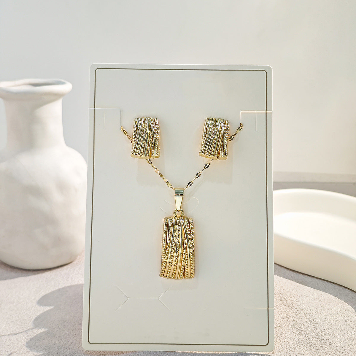 Conjunto de joyería elegante con diseño geométrico clásico de acero inoxidable 304 chapado en oro al por mayor