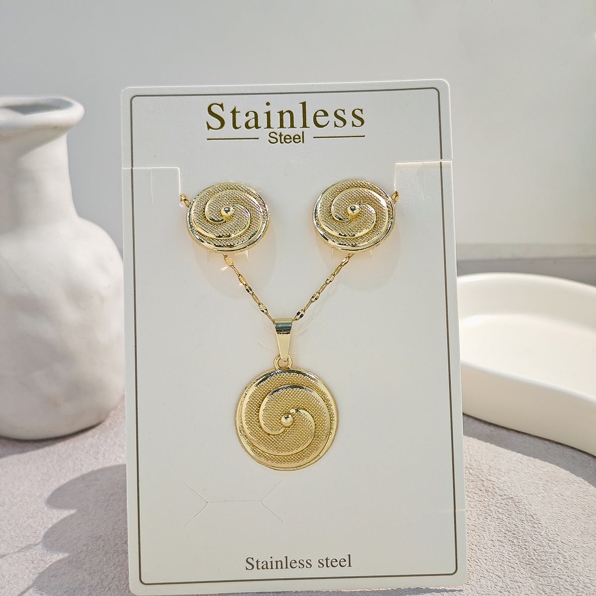 Conjunto de joyería elegante con diseño geométrico clásico de acero inoxidable 304 chapado en oro al por mayor