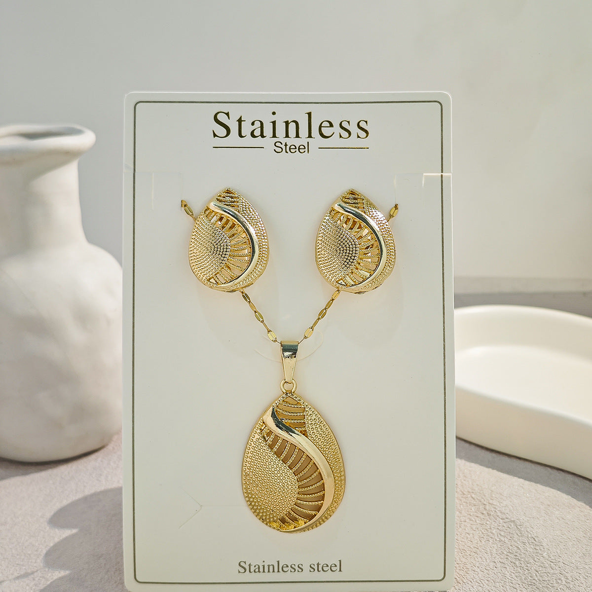 Conjunto de joyería elegante con diseño geométrico clásico de acero inoxidable 304 chapado en oro al por mayor