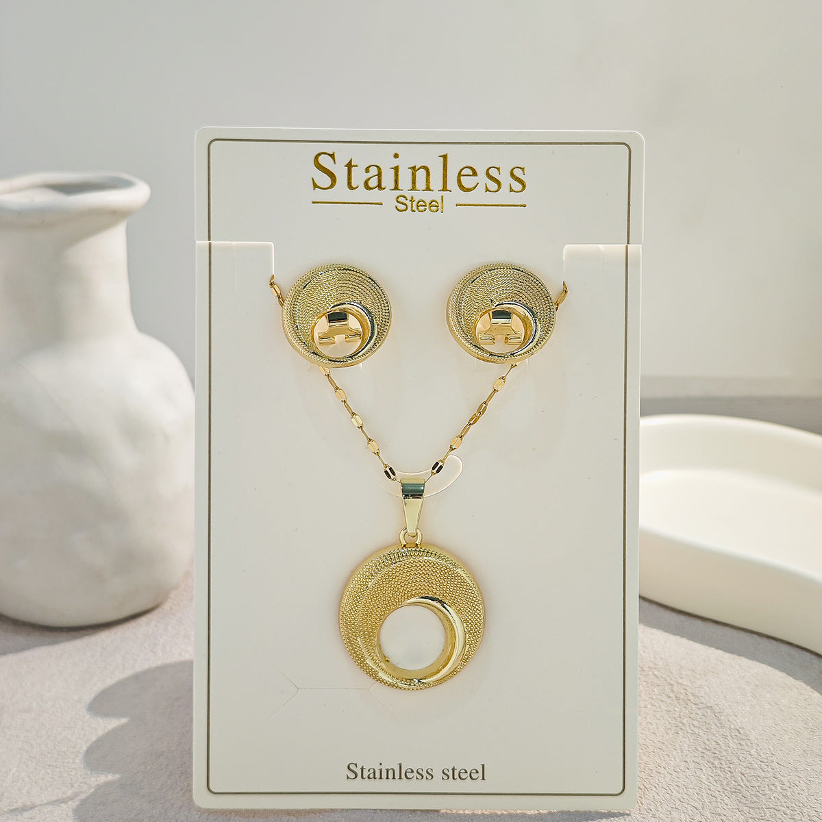 Conjunto de joyería elegante con diseño geométrico clásico de acero inoxidable 304 chapado en oro al por mayor