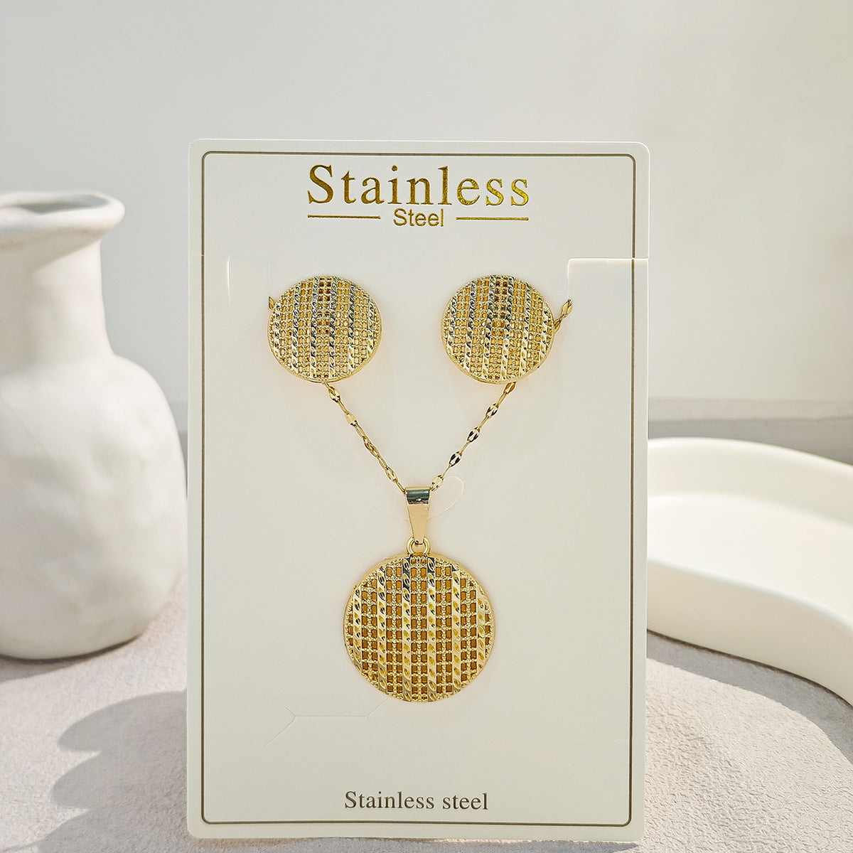 Conjunto de joyería elegante con diseño geométrico clásico de acero inoxidable 304 chapado en oro al por mayor