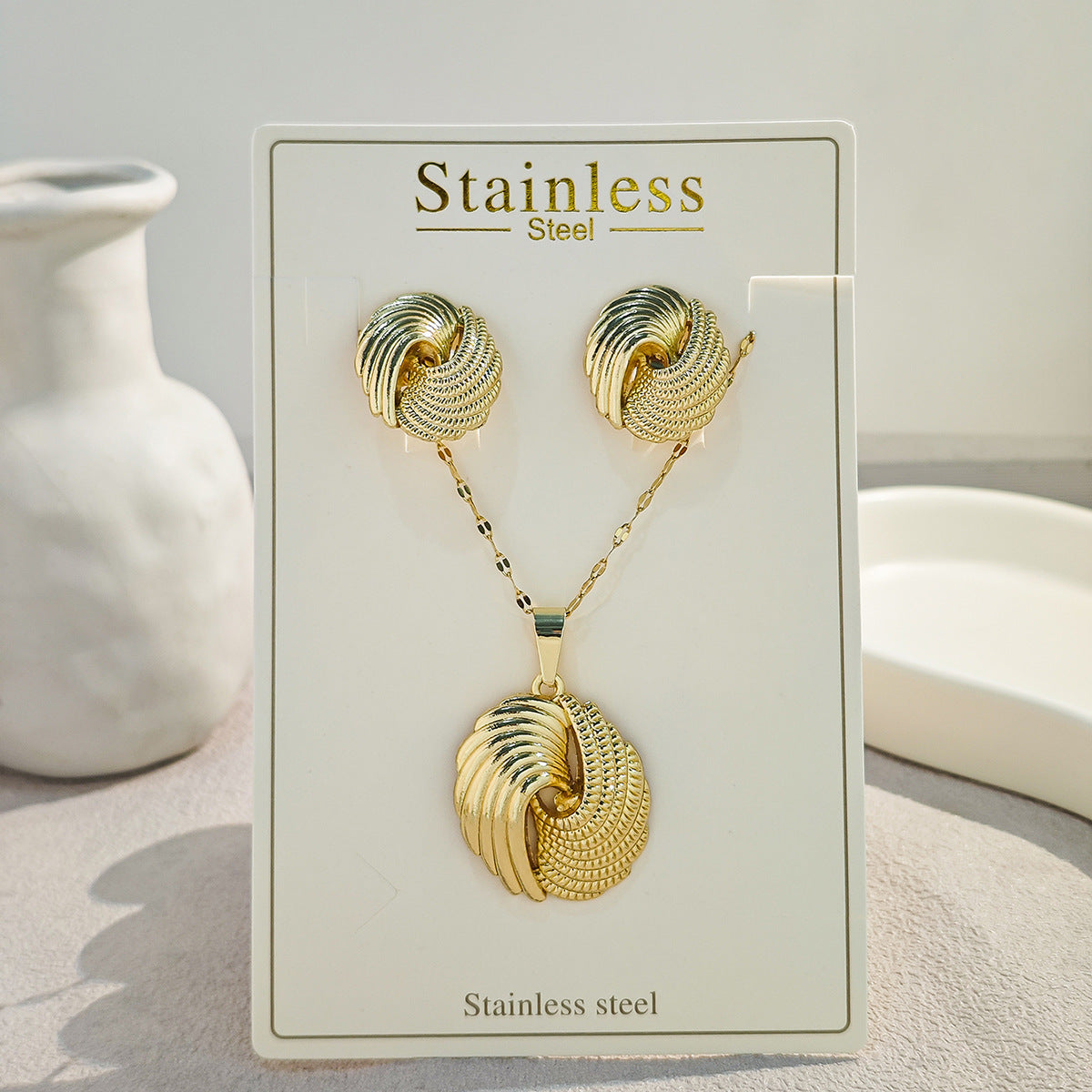 Conjunto de joyería elegante con diseño geométrico clásico de acero inoxidable 304 chapado en oro al por mayor
