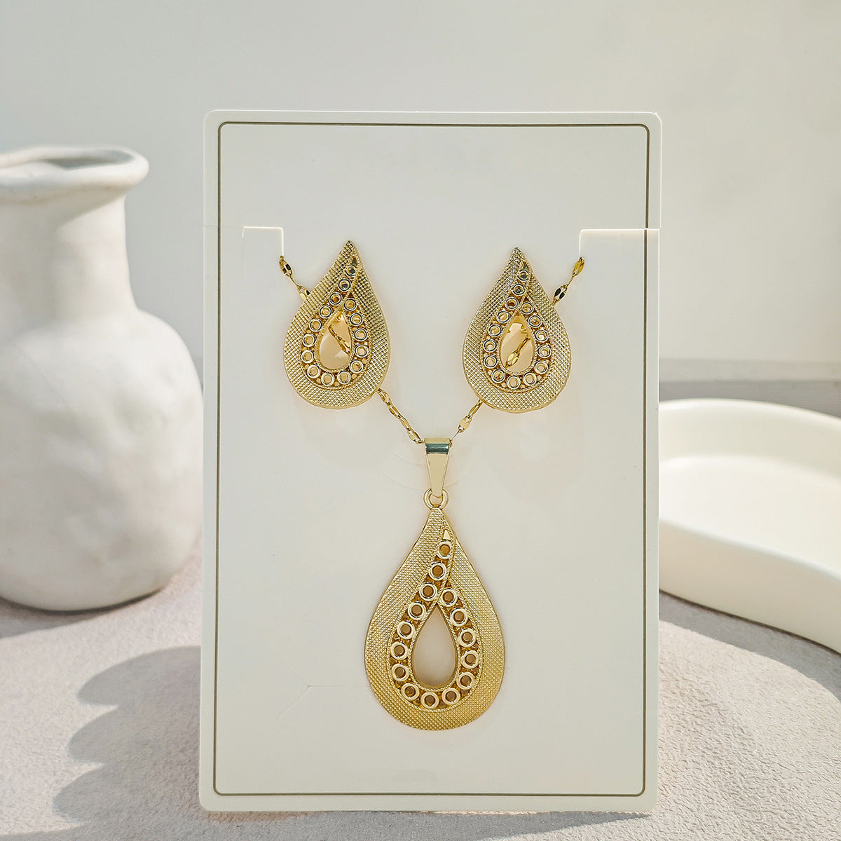 Conjunto de joyería elegante con diseño geométrico clásico de acero inoxidable 304 chapado en oro al por mayor