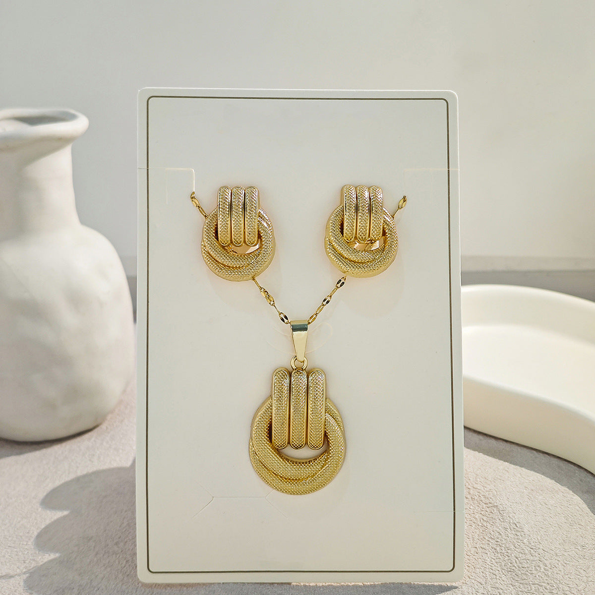 Conjunto de joyería elegante con diseño geométrico clásico de acero inoxidable 304 chapado en oro al por mayor