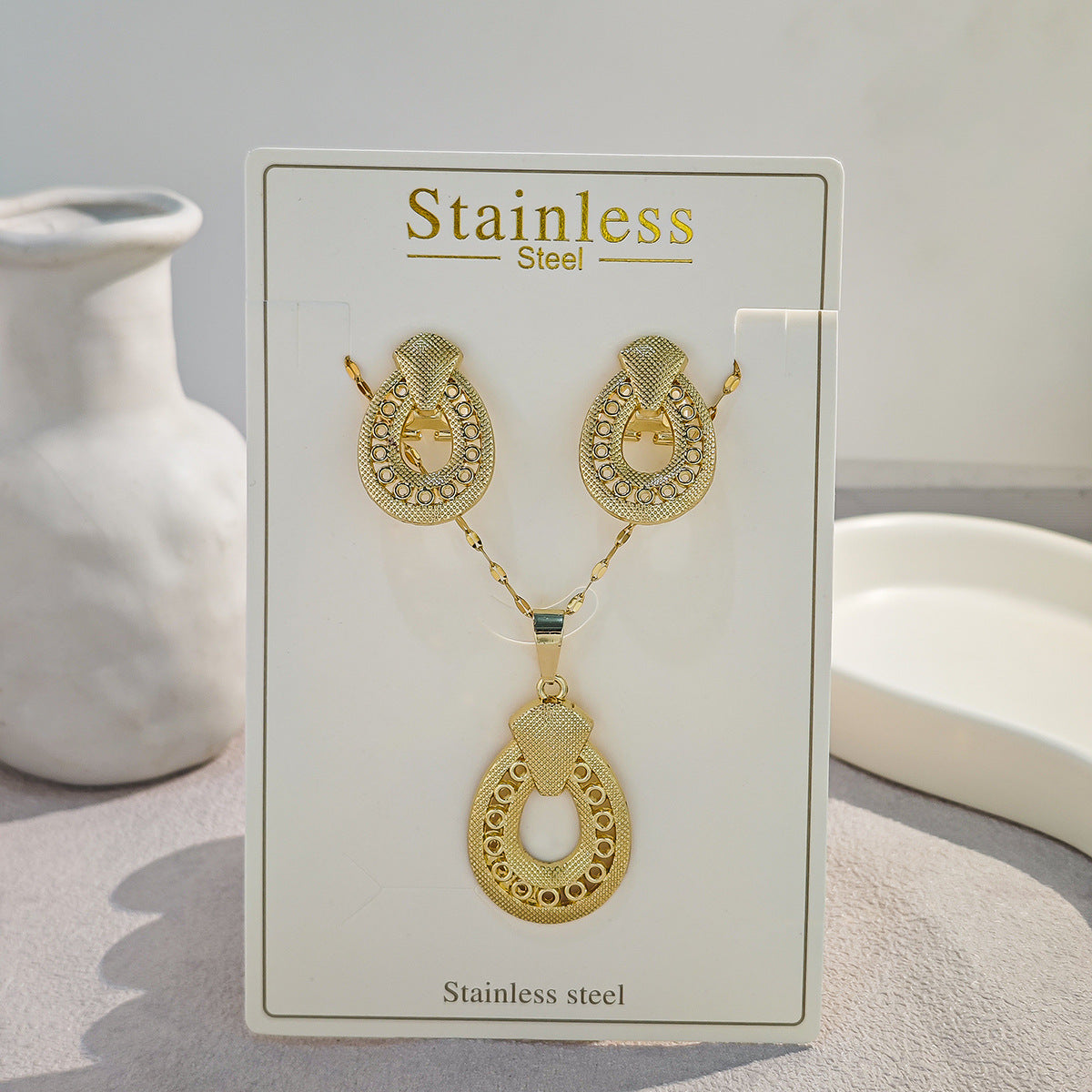 Conjunto de joyería elegante con diseño geométrico clásico de acero inoxidable 304 chapado en oro al por mayor