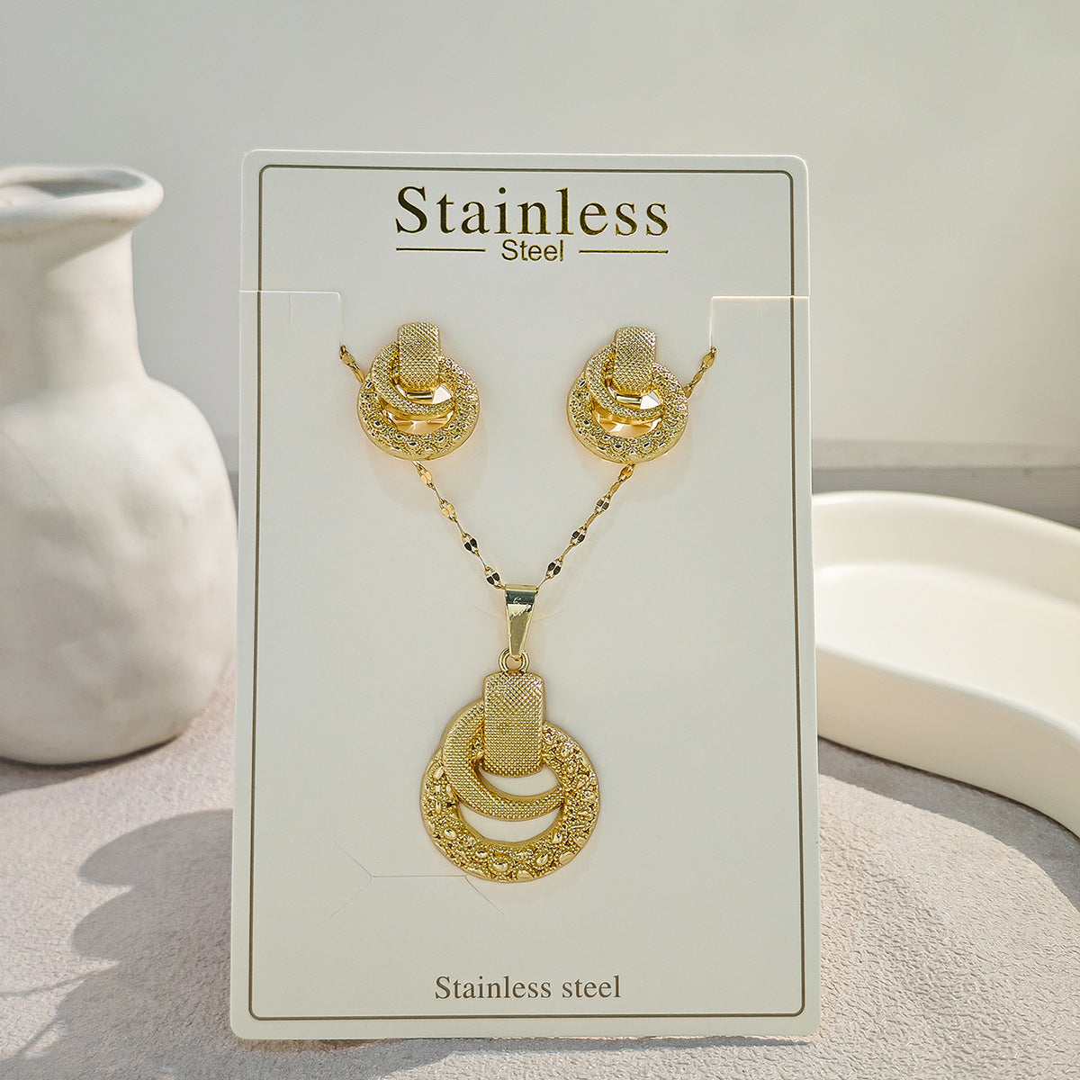 Conjunto de joyería elegante con diseño geométrico clásico de acero inoxidable 304 chapado en oro al por mayor
