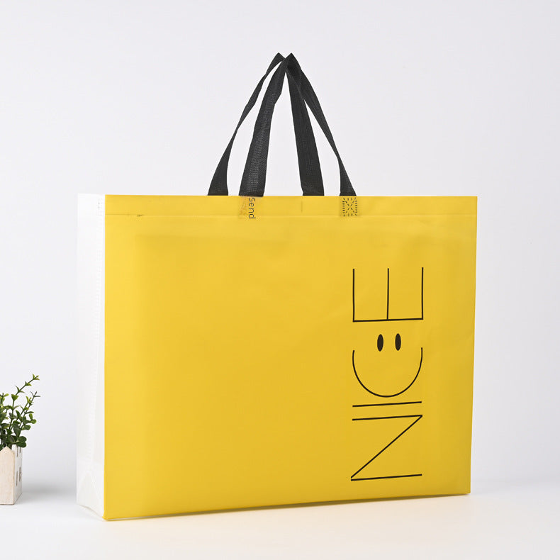 Bolsa de ropa no tejida prensada en caliente, disponible en stock, bolsa con expresión facial sonriente, bolsa de ropa para niños con impresión a color, bolsa de publicidad, impresión LO (por 50 piezas)