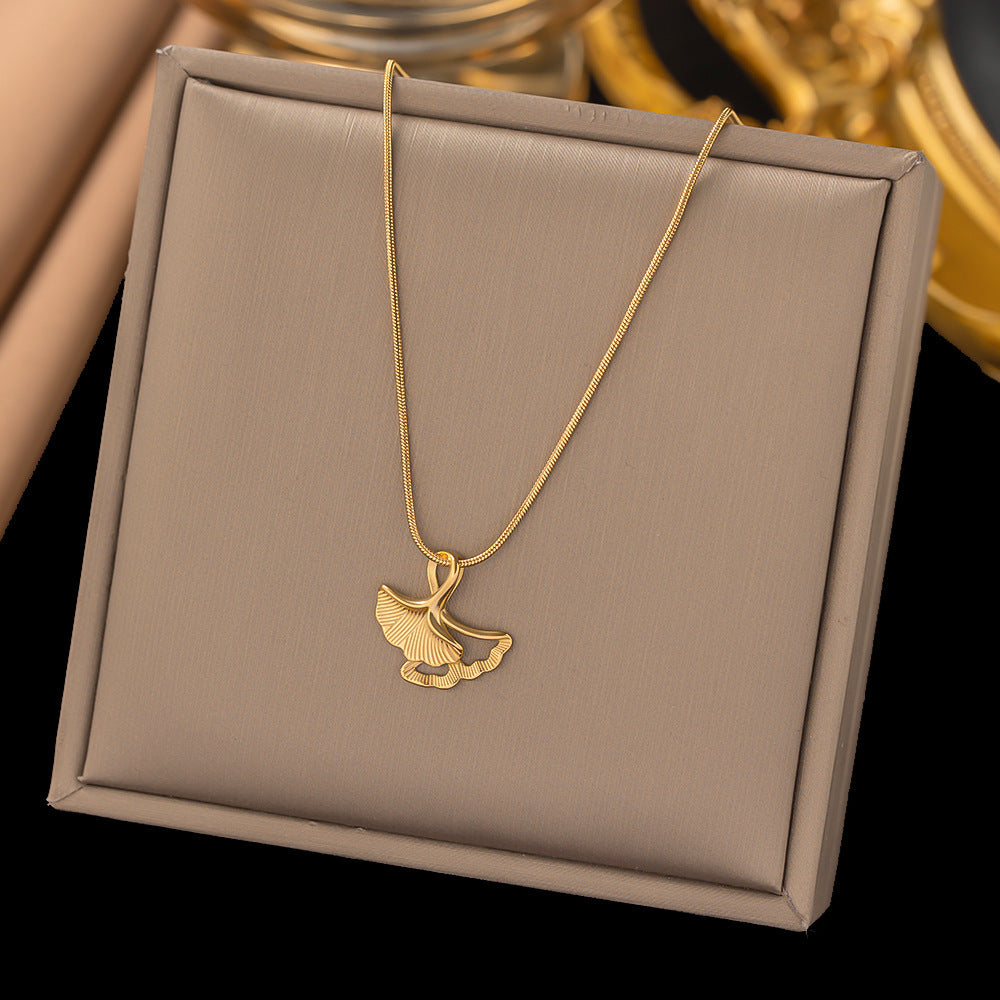 Collar con colgante de acero de titanio chapado en forma de corazón, con forma de estrella de mar, estilo IG, estilo dulce y sencillo, con lazo y nudo.