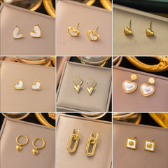 1 par de pendientes colgantes de acero de titanio con baño de concha, con forma de corazón, estilo dulce y sencillo