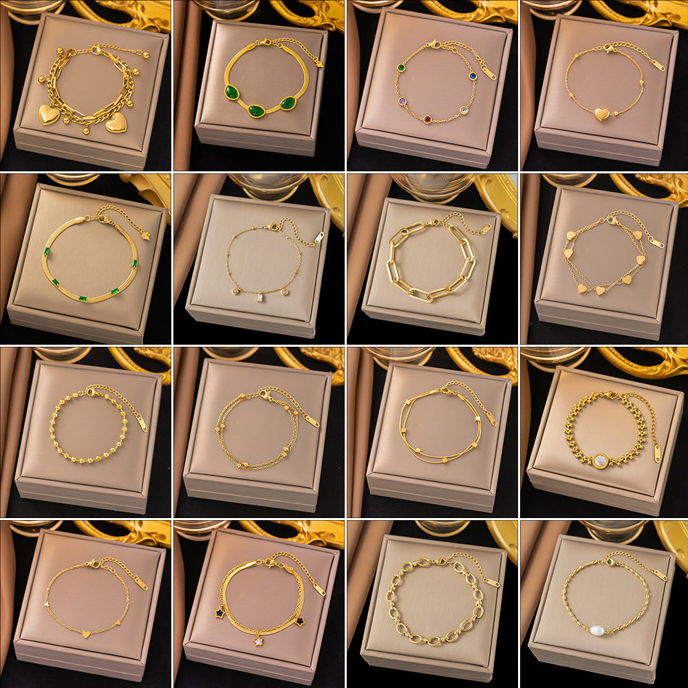 Elegantes pulseras básicas de ropa urbana con forma de corazón, mariposa, acero titanio y circonitas, disponibles a granel.