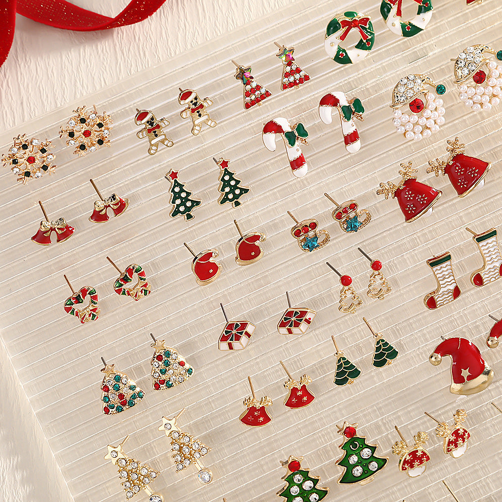 1 par de pendientes de aleación chapados en estilo nórdico con diseño de árbol de Navidad, muñeco de nieve y copo de nieve.