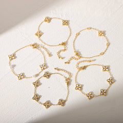 Pulseras de acero inoxidable 304 con circonita acrílica bañadas en oro de 18 quilates, estilo clásico, con diseño de flor de viaje, a granel.