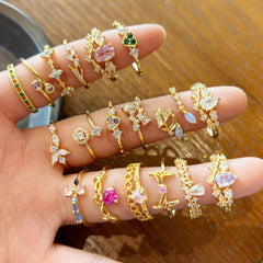 Anillos abiertos con incrustaciones geométricas de circonitas y baño de oro de 18 quilates