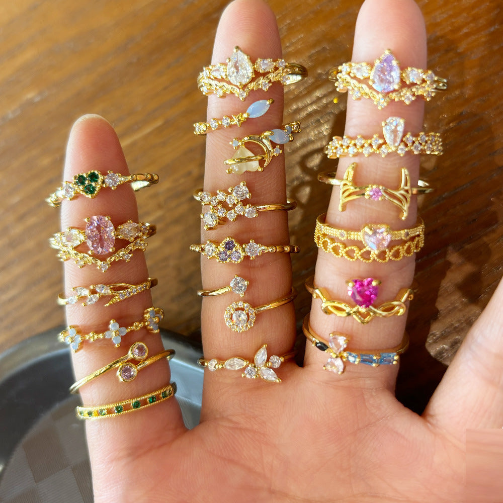 Anillos abiertos con incrustaciones geométricas de circonitas y baño de oro de 18 quilates