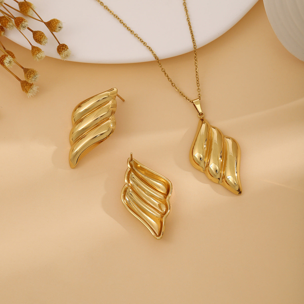 Conjunto de joyería elegante de acero inoxidable chapado en forma de corazón, geométrico, retro, con flores, venta al por mayor