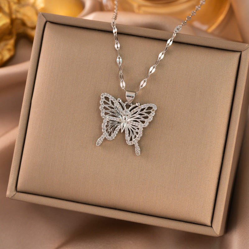 Collar con colgante de acero de titanio con incrustaciones de diamantes de imitación y forma de corazón de estrella de animal elegante al por mayor