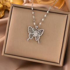 Collar con colgante de acero de titanio con incrustaciones de diamantes de imitación y forma de corazón de estrella de animal elegante al por mayor