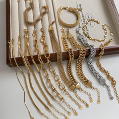 Pulseras de acero inoxidable 304 con diseño geométrico de estilo sencillo, bañadas en oro blanco de 16 quilates, disponibles a granel.