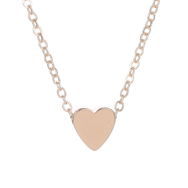 Collar pequeño con forma de corazón fresco, mini colgante tridimensional brillante de amor, cadena de clavícula femenina de alta calidad