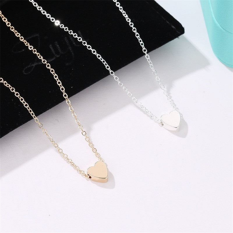 Collar pequeño con forma de corazón fresco, mini colgante tridimensional brillante de amor, cadena de clavícula femenina de alta calidad