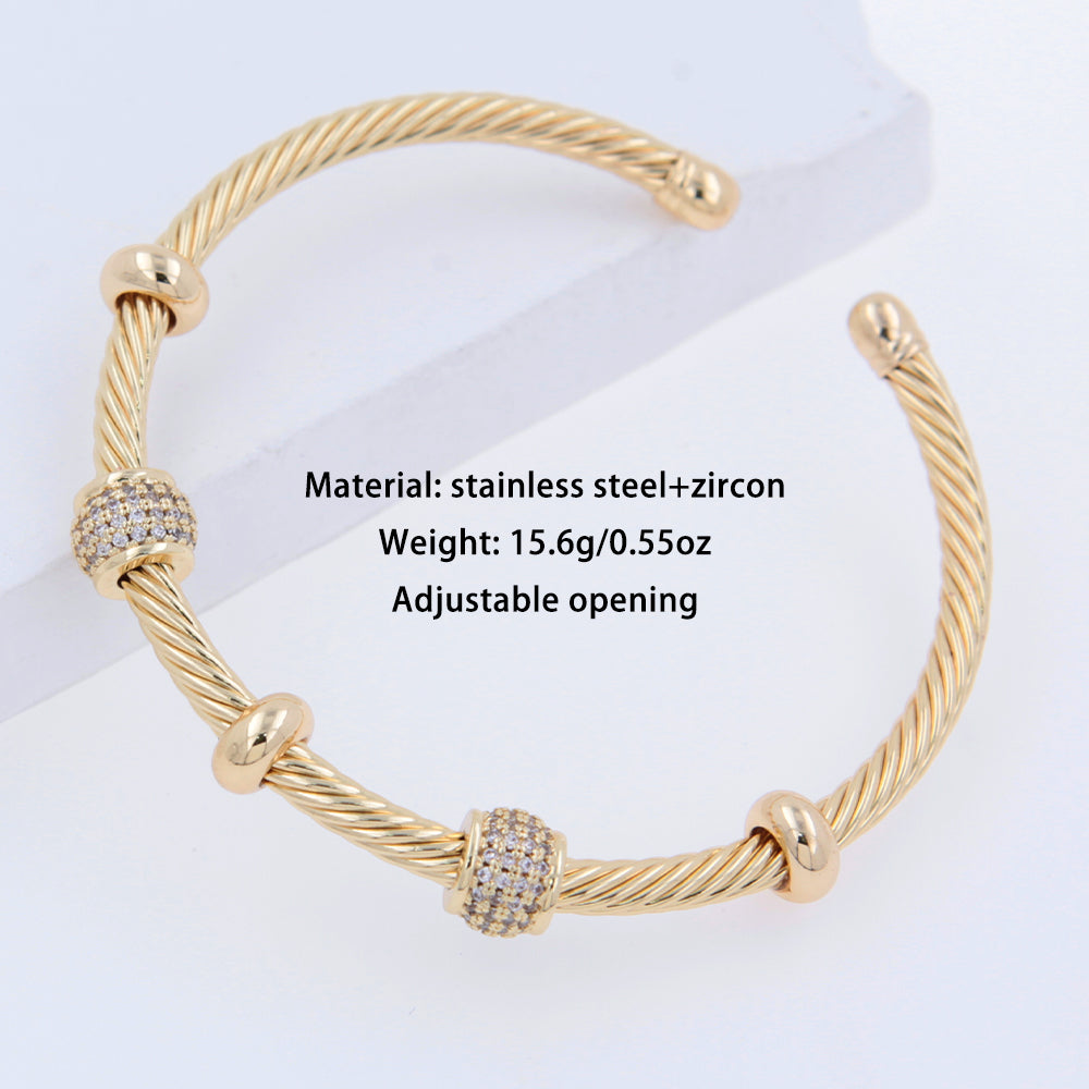 Brazalete de acero inoxidable 304 con circonitas chapadas en oro de 18 quilates, estilo hip-hop punk, con forma de U y raya espiral, disponible al por mayor.
